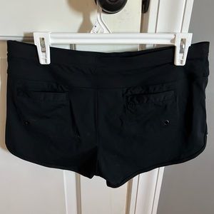 Athleta black swim shorts with liner